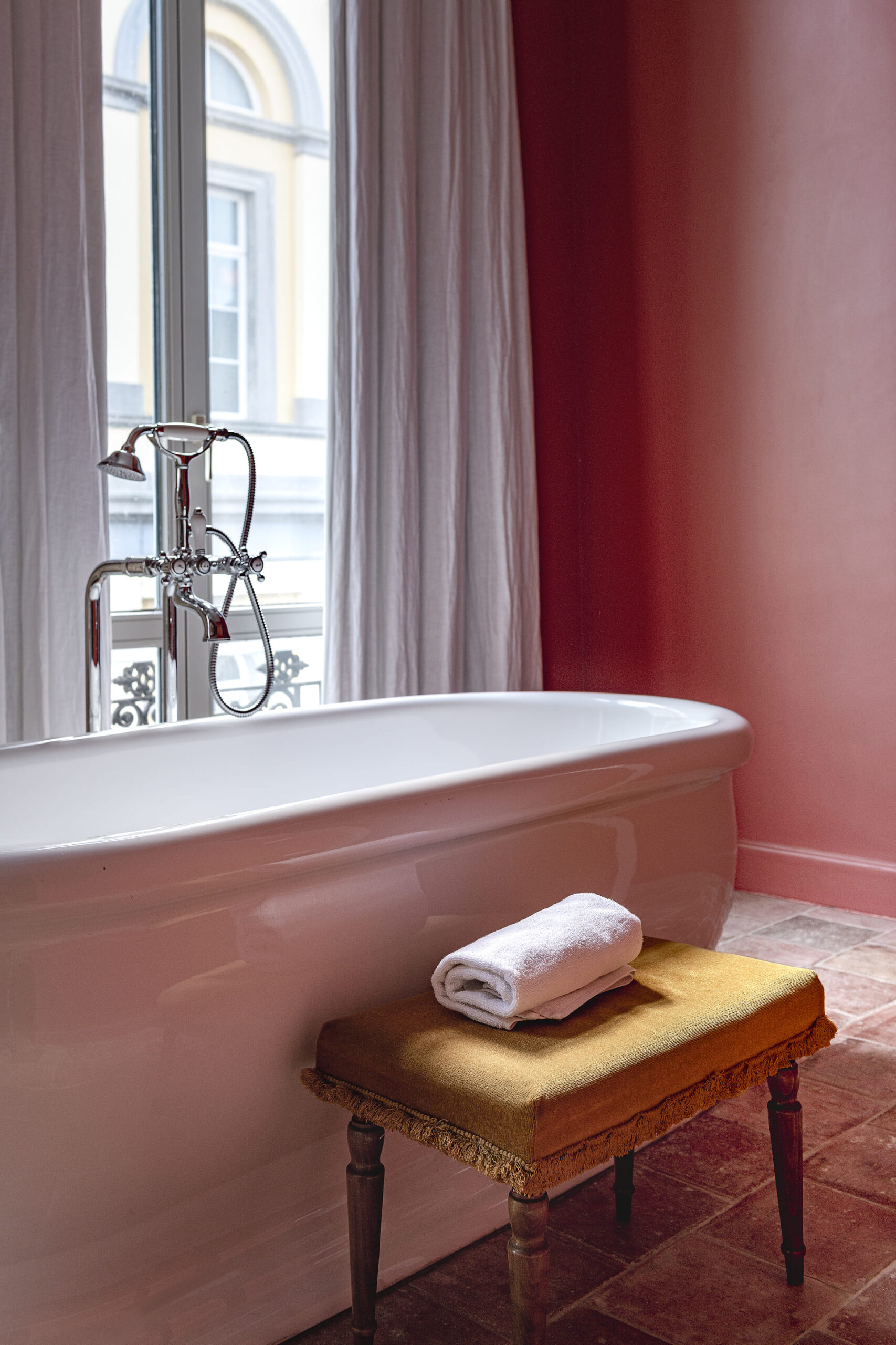 Bathtub-in-red-room-scaled.jpg